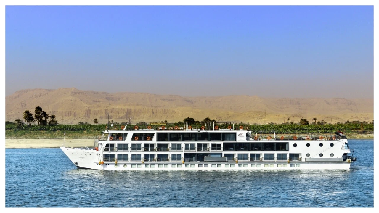 Clear photograph of the river cruise ship Viking Ra sailing on the Nile River, which directly matches the article topic.