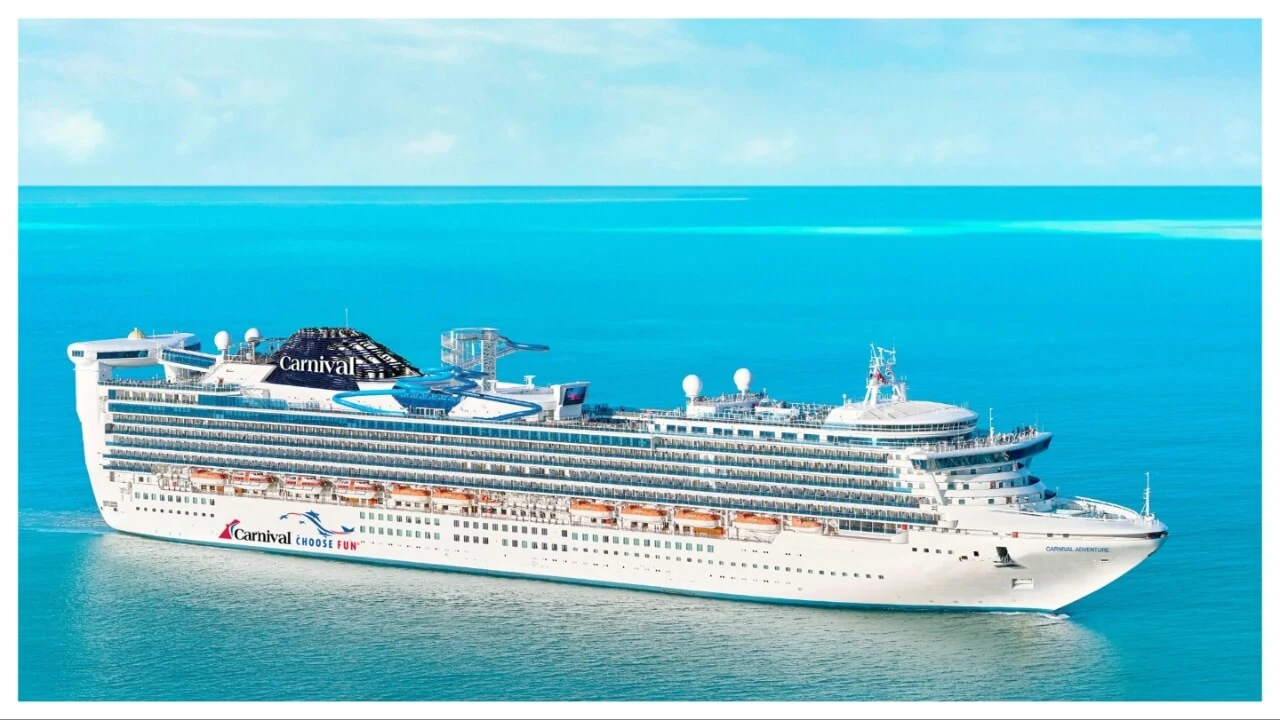 Clear photograph of the cruise ship Carnival Adventure at sea, matching the article discussion of Carnival Adventure's upcoming deployment changes.